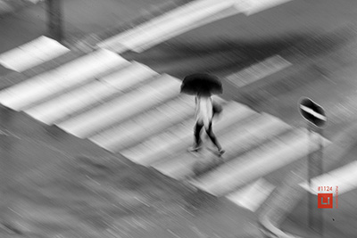 street photography paris walking in the rain